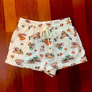 Urban Outfitters cream shorts with mushroom print, size S